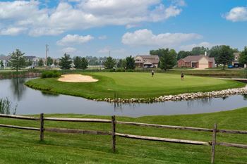 Gorgeous landscaping & pond area